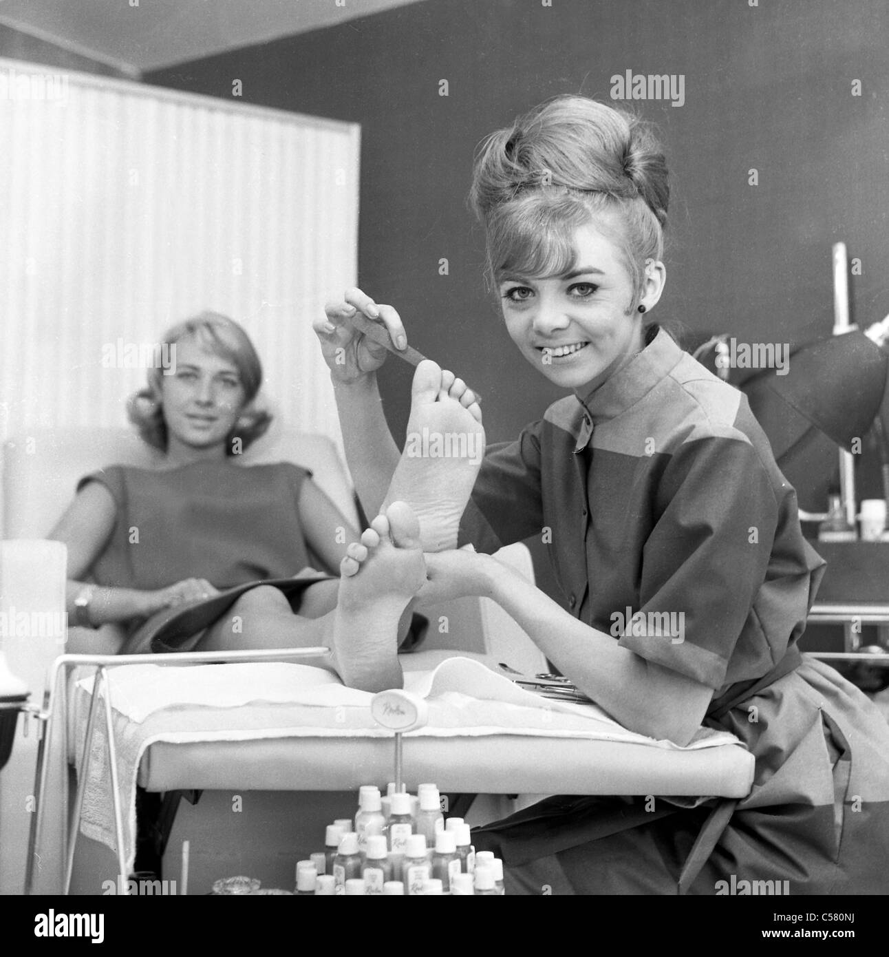 Janice Nicholls working as a chiropodist after appearing on the 1960s TV show Thank Your Lucky Stars Stock Photo