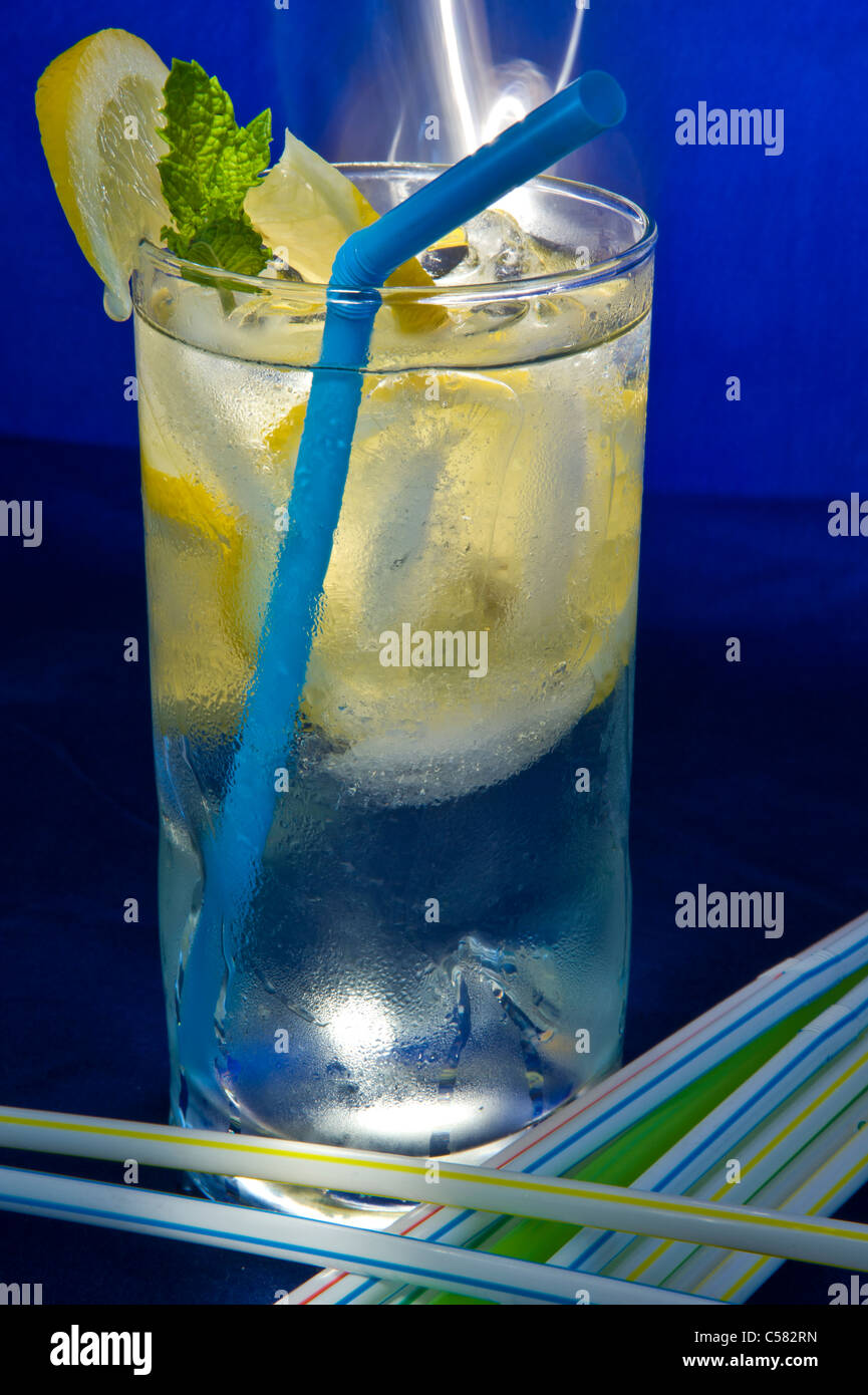 Refreshing ice water and slices of Lemon Stock Photo - Alamy