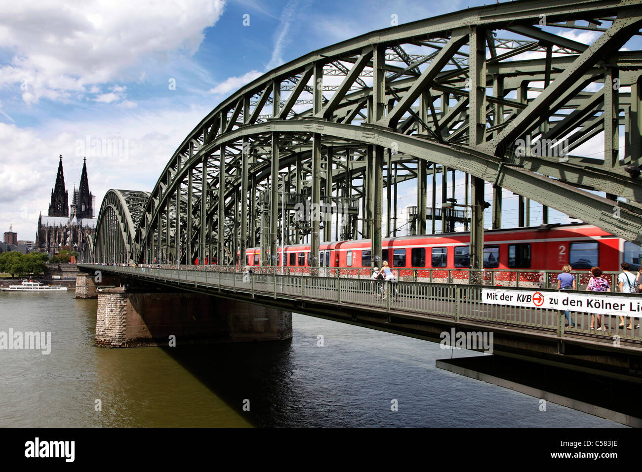 Skyline of Cologne, Germany. River Rhine, Hohenzollern railway bridge, Cologne cathedral. Stock Photo