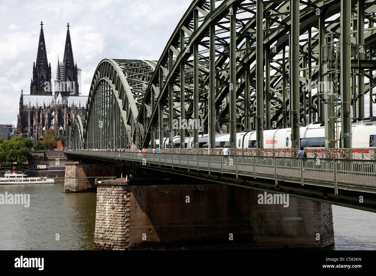 Skyline of Cologne, Germany. River Rhine, Hohenzollern railway bridge, Cologne cathedral. Stock Photo