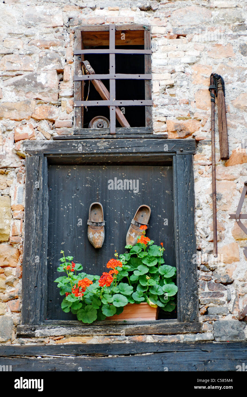 Colmar, Alsace, Alsatia, France, town, old town, historic, timber frame construction, facade, window, geranium, flowers, decorat Stock Photo