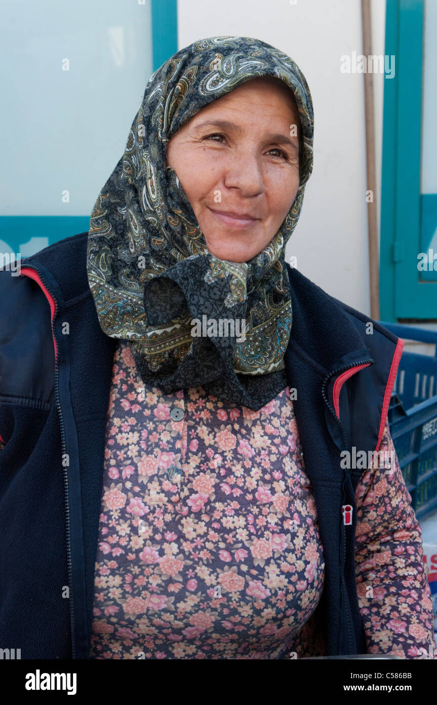 Turkish woman stallholder at a weekly market Stock Photo