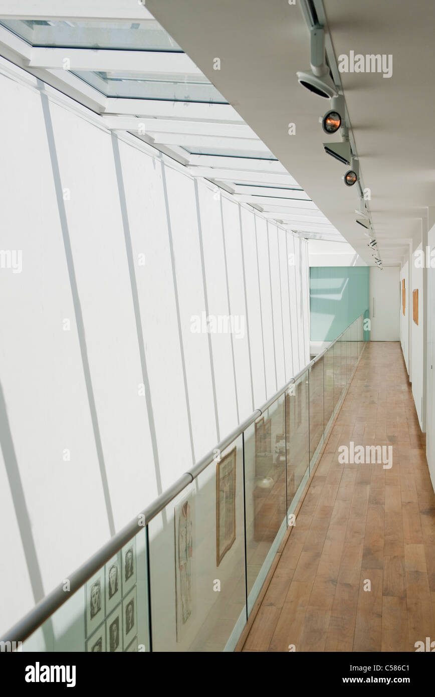 Double height hallway and glass balustrade Stock Photo Alamy