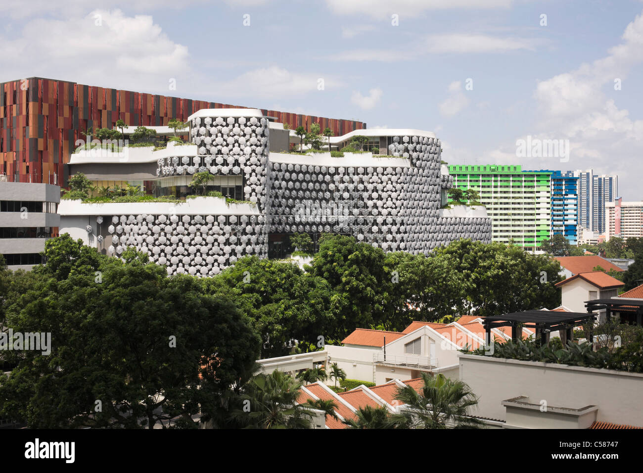 Exterior of iluma shopping and cinema complex in Singapore by WOHA Facade lighting by realities