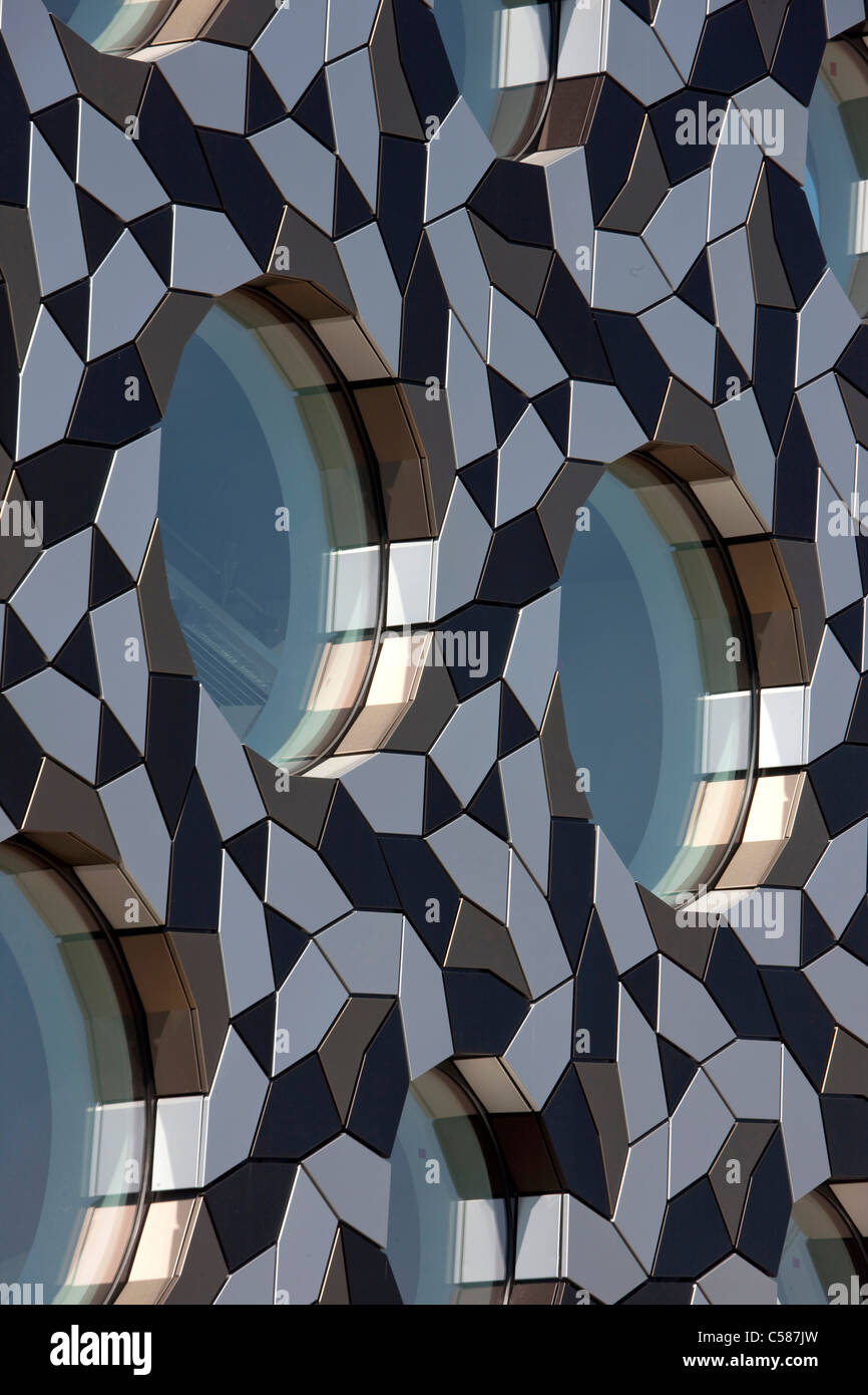 Ravensbourne, Greenwich, London. Round windows and Penrose pattern aluminium cladding. Stock Photo