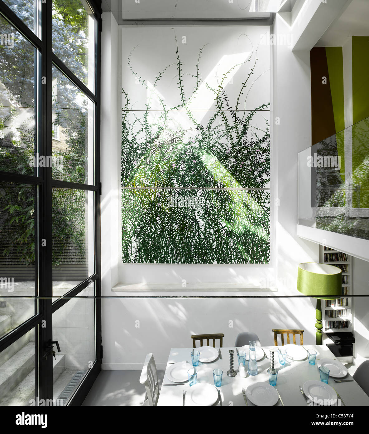 Double Height House Extension creating new Dining Room in Islington House by Dominic McKenzie. Stock Photo