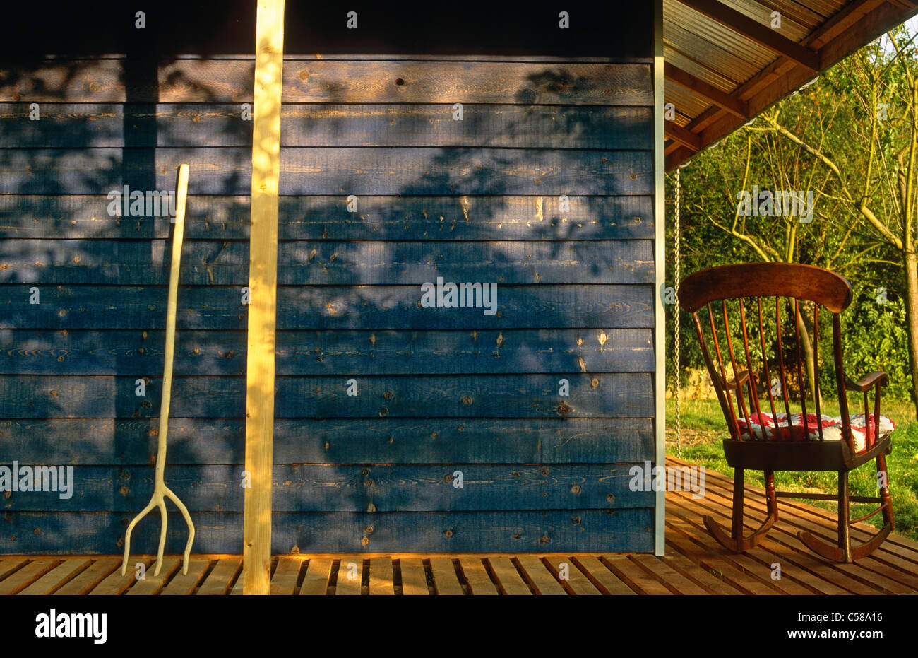 Rocking chair on verandah with folk cushion USA Stock Photo Alamy