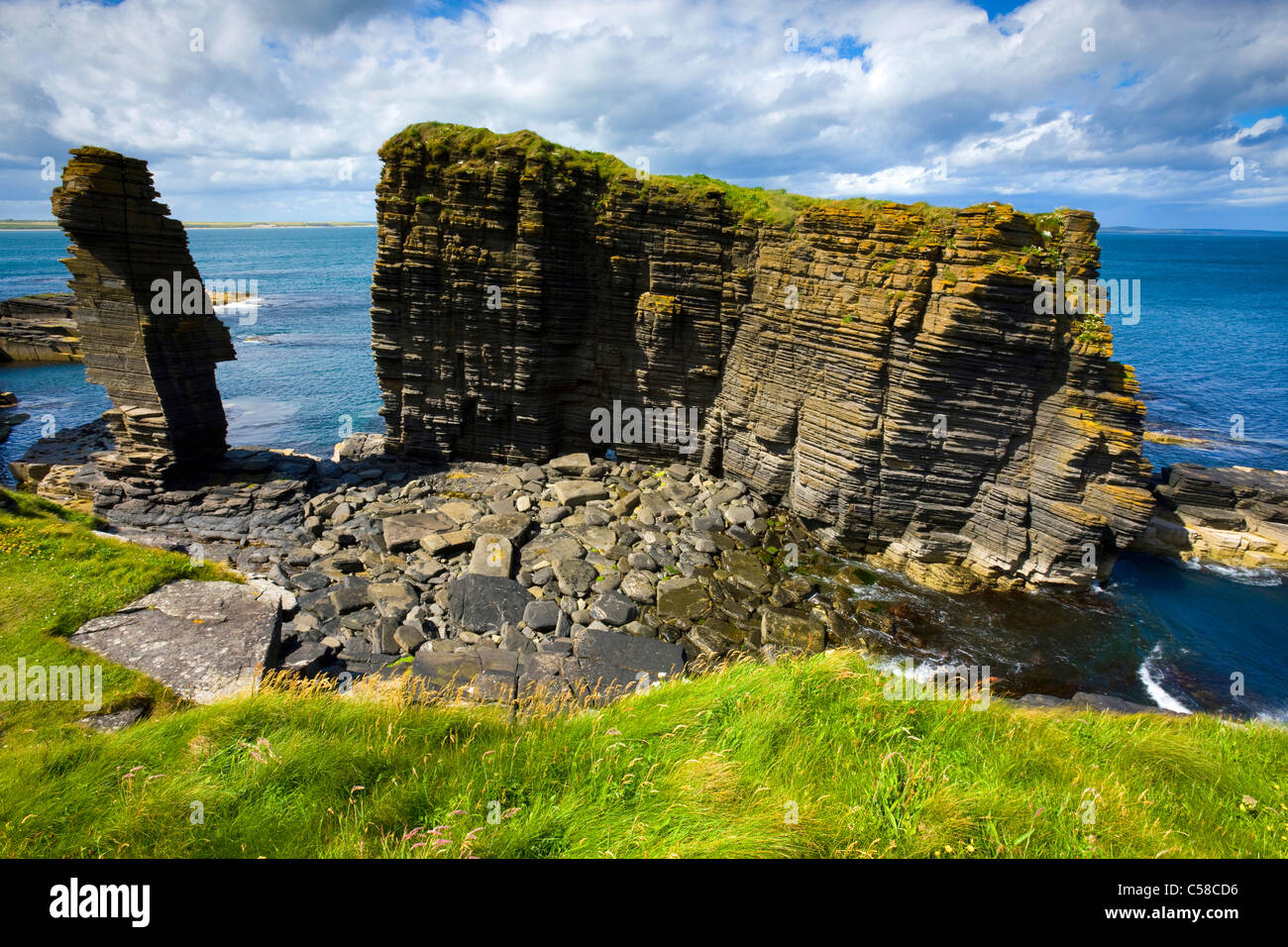 Noss Head, Great Britain, Scotland, Europe, sea, coast, rock, cliff, cliff tower, erosion, clouds Stock Photo