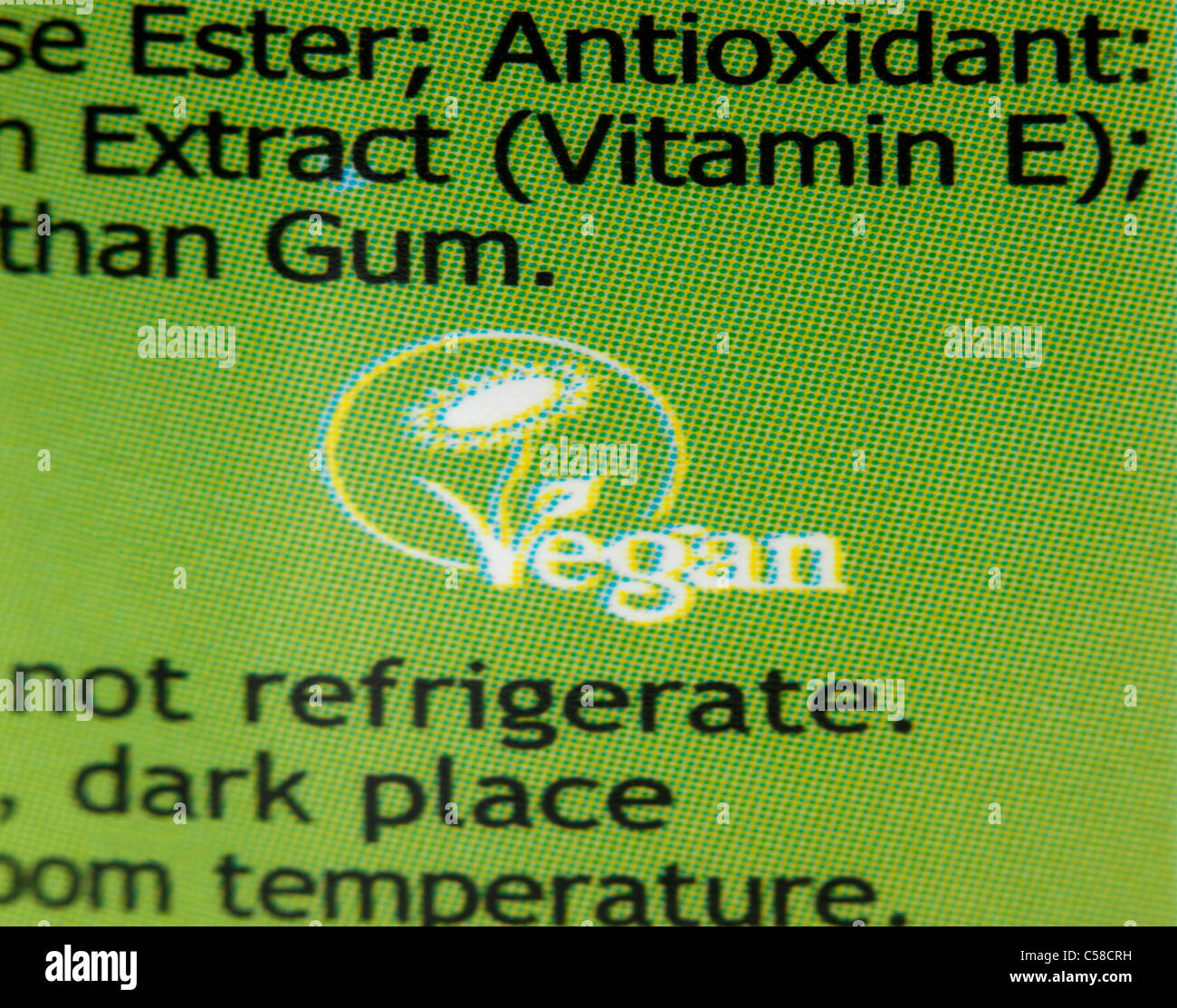 Close Up Of Vegetarian Society Approved And Vegan Symbols On Cooking Spray Stock Photo