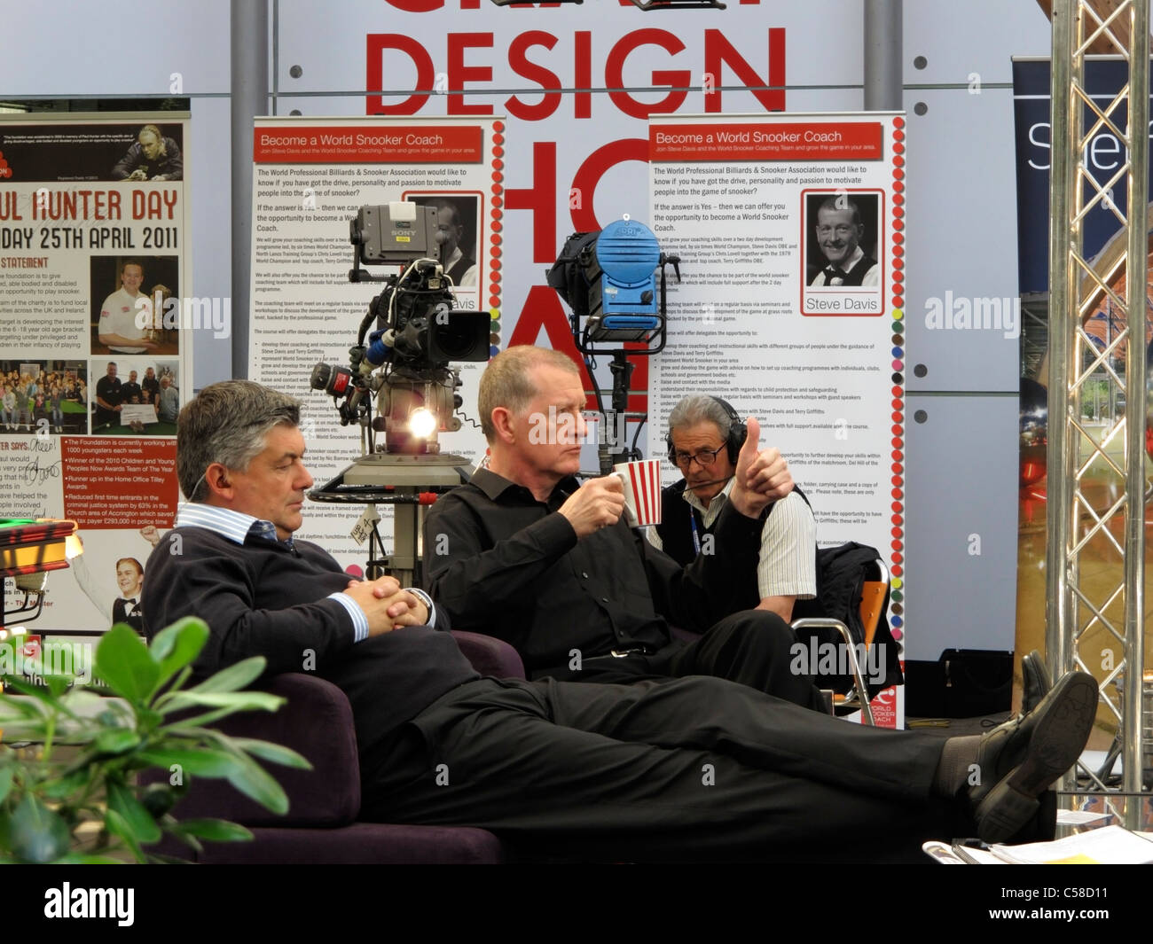 Snooker players Steve Davis and John Parrott commentating on the Embassy world snooker in Sheffield South Yorkshire Stock Photo