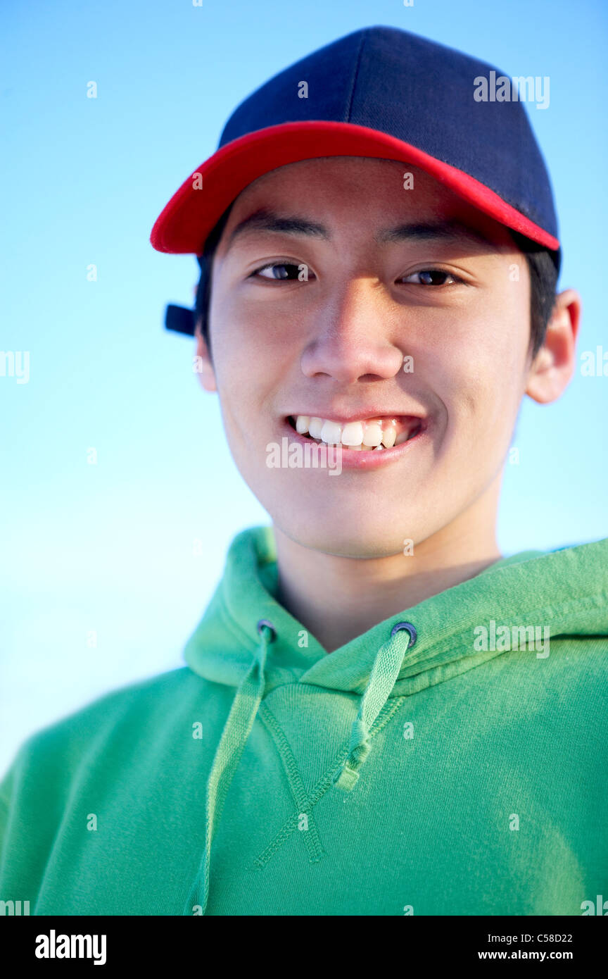 Portrait of teenage boy smiling Stock Photo - Alamy