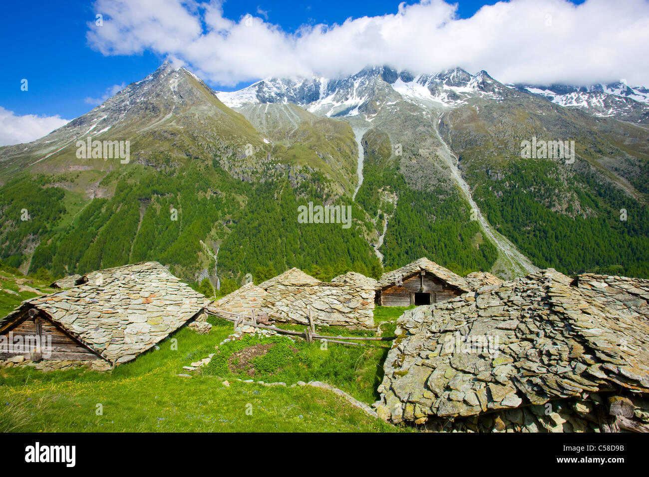 Louché, Switzerland, Europe, canton Valais, nature reserve Val d'Hérens, Alp, nightmare huts, stone roofs, view, valley, mountai Stock Photo