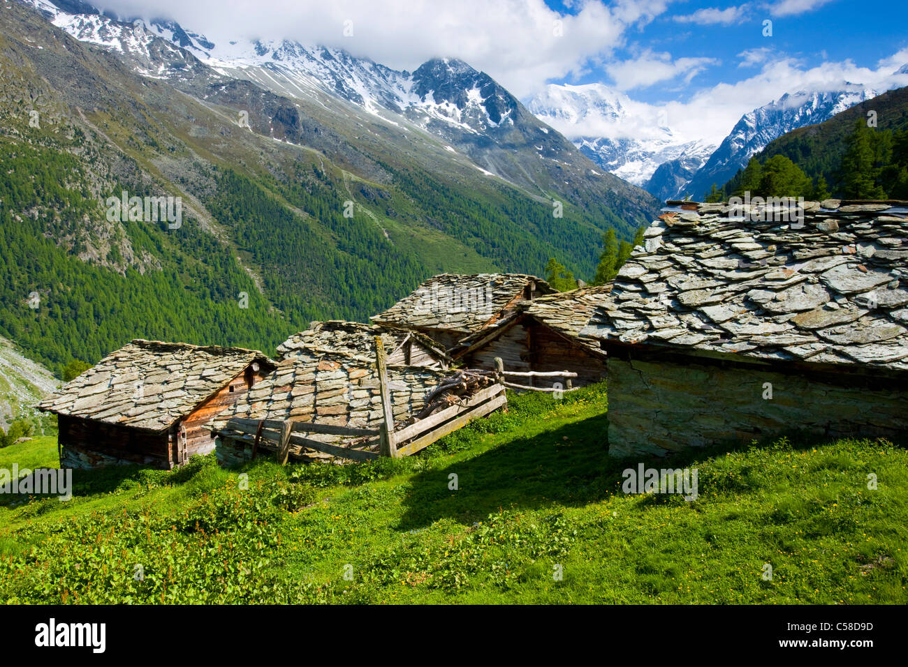 Louché, Switzerland, Europe, canton Valais, nature reserve Val d'Hérens, Alp, nightmare huts, stone roofs, view, valley, mountai Stock Photo