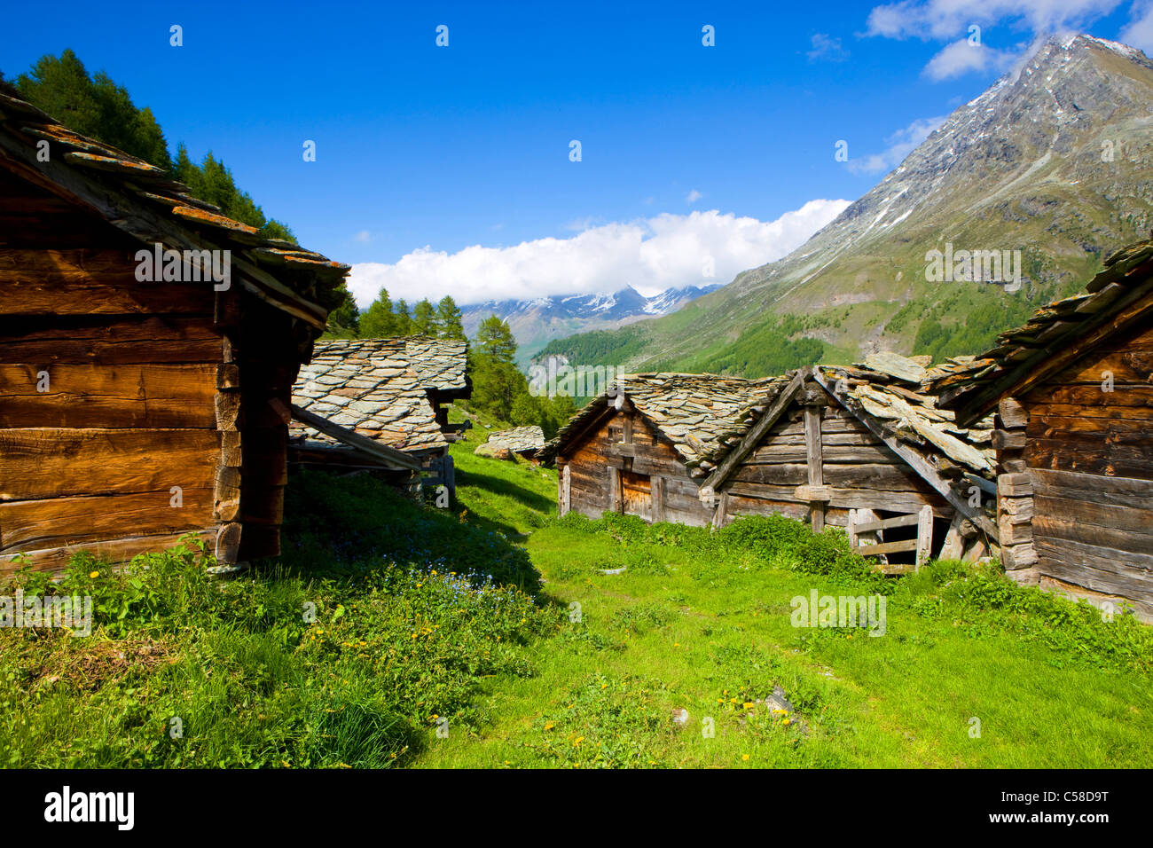 Louché, Switzerland, Europe, canton Valais, nature reserve Val d'Hérens, Alp, nightmare huts, stone roofs, view, valley, mountai Stock Photo