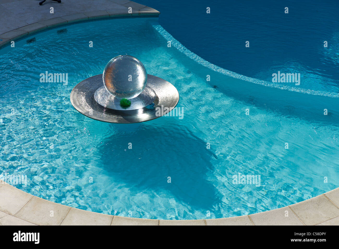Outdoors swimming pool in Guernsey with water feature Stock Photo Alamy