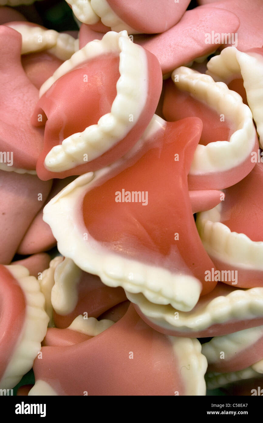 Joke confectionery sweets in the shape of teeth or dentures. Can be
