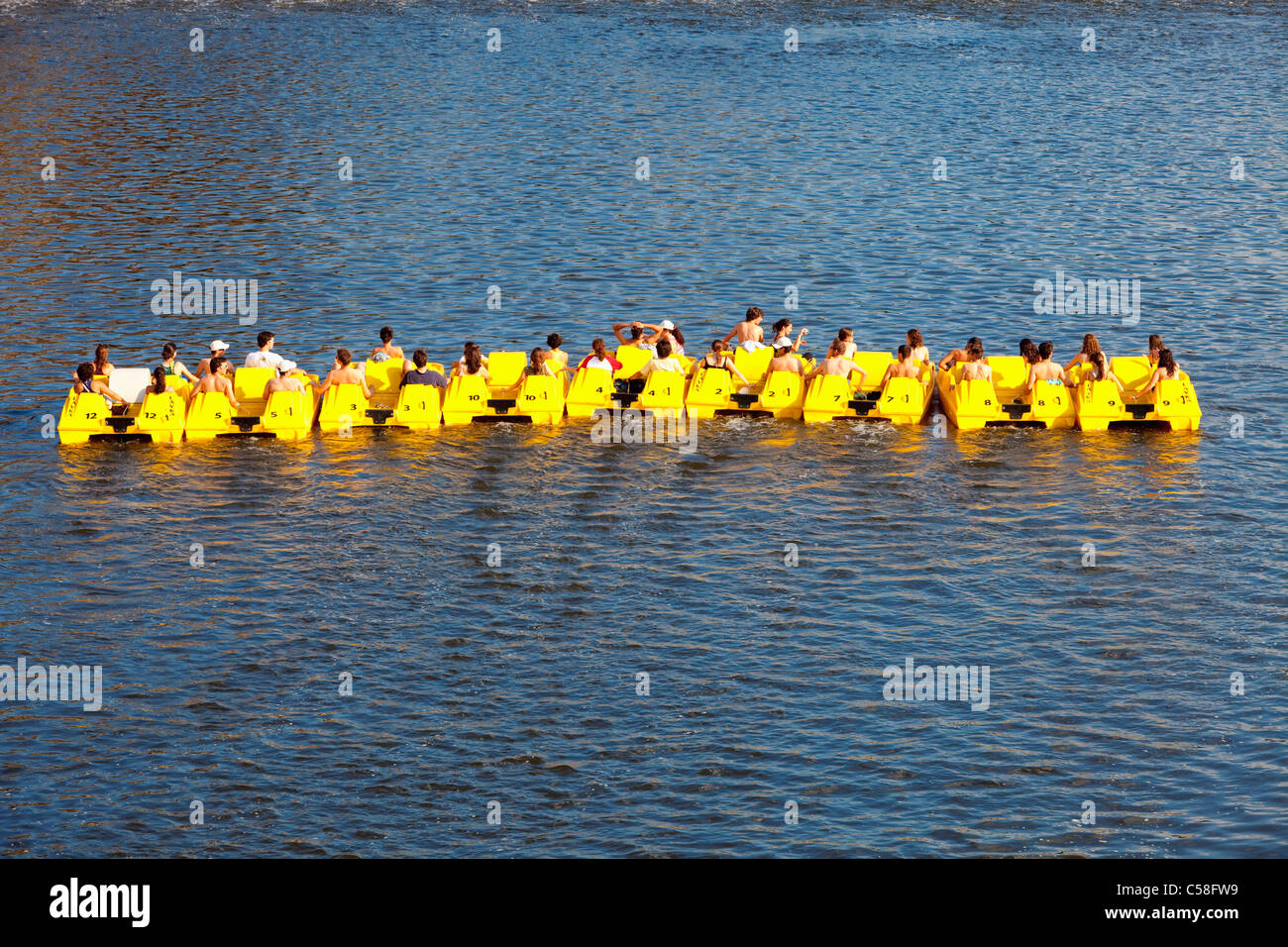 boat, boats, city, Czech republic, day, daytime, Europe, fun, Prague, pedalos, people, river, summer, Vltava, water Stock Photo