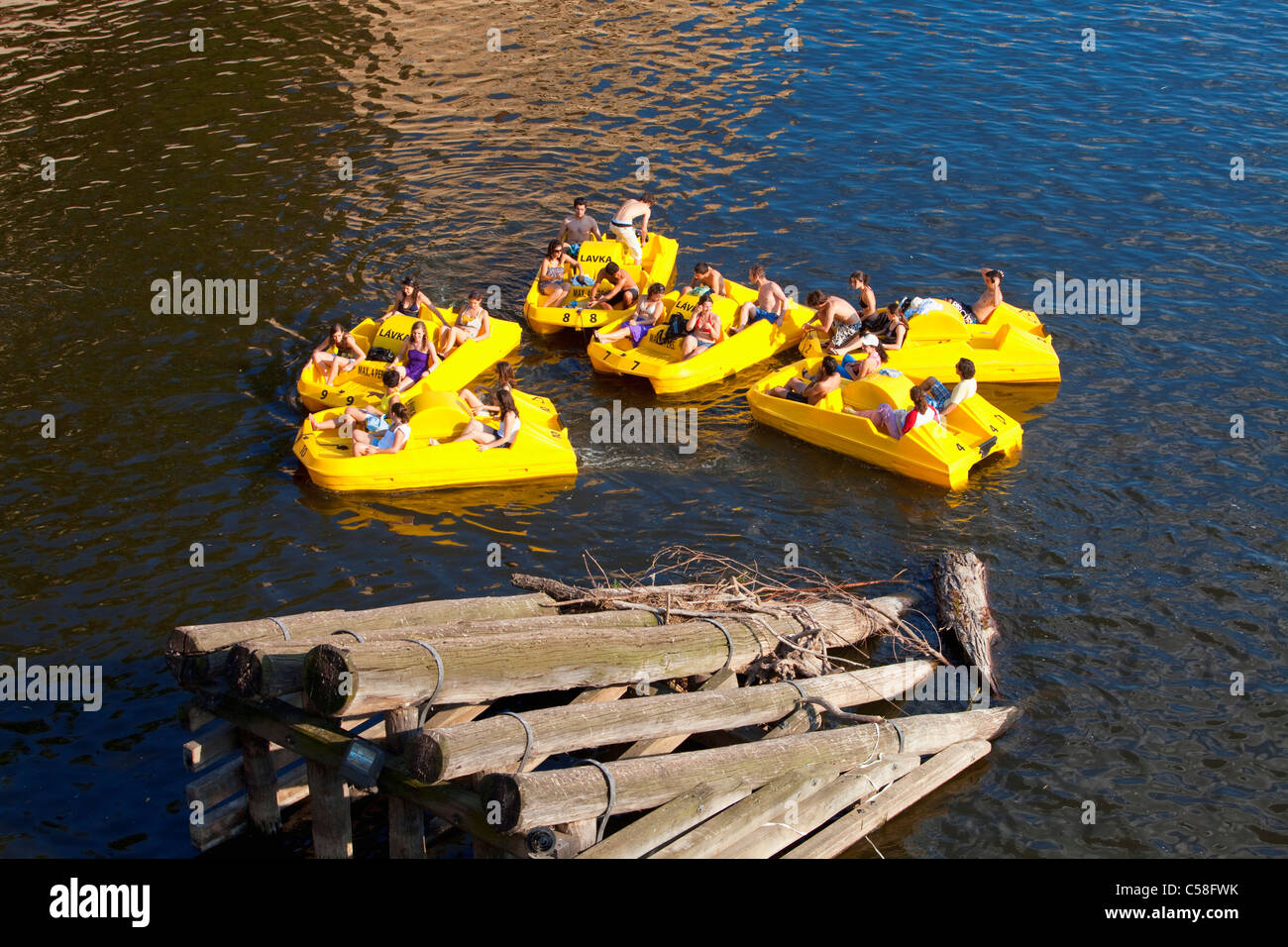 boat, boats, city, Czech republic, day, daytime, Europe, fun, Prague, pedalos, people, river, summer, Vltava, water Stock Photo