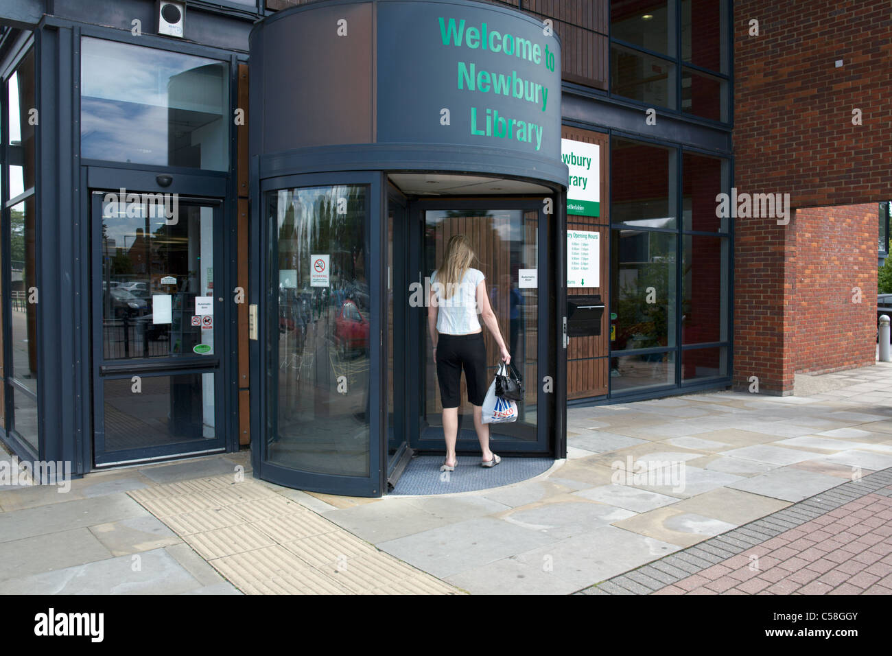 Entrance to Newbury Library Berkshire England UK with one woman entering Stock Photo