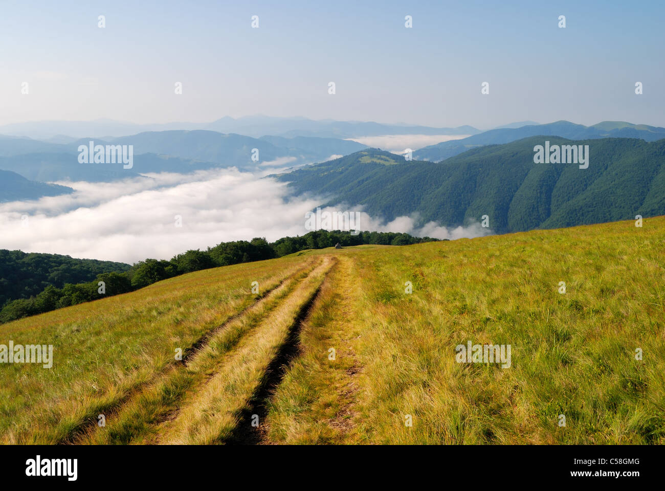 Clouds over the mountain valley in the morning Stock Photo