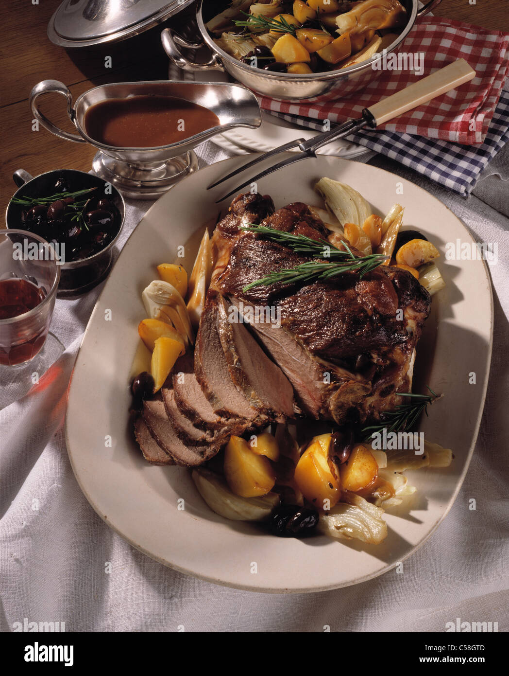 Braised lamb haunch with fennel Stock Photo Alamy