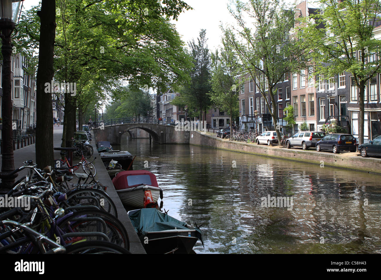 Quiet canal (gracht) in Amsterdam Stock Photo