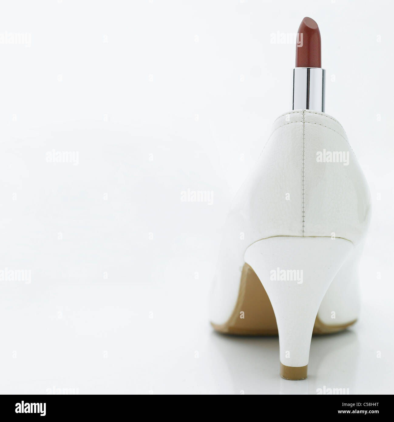 Closeup of high heel shoe with lipstick Stock Photo Alamy
