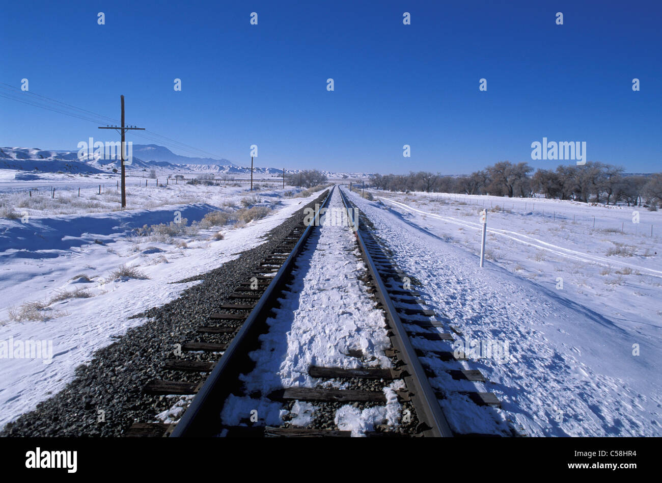 Tracks, snow, near San Felipe pueblo, Rio Grande Valley, New Mexico, USA, United States, America, railway, transportation Stock Photo