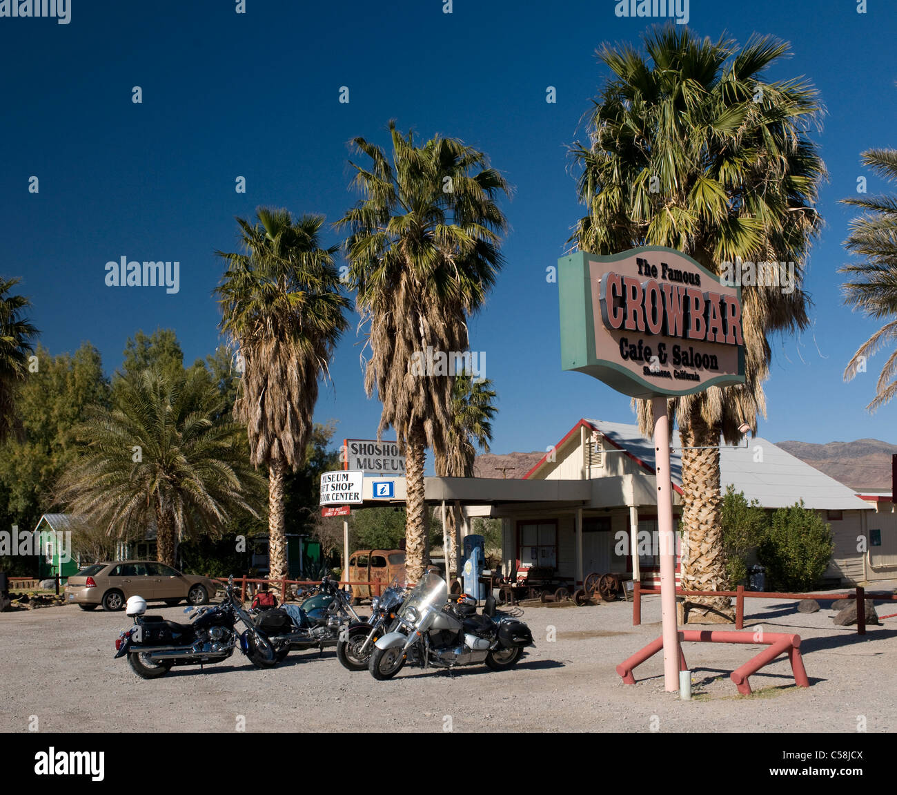 Crowbar Cafe, Saloon, Shoshone, California, USA, United States, America, palm trees, motor bikes Stock Photo