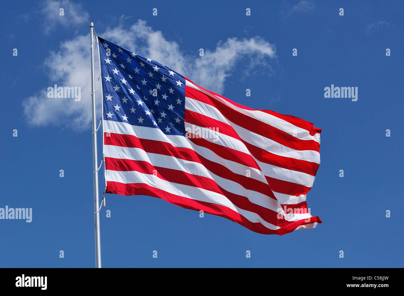 American Flag, blue, sky, white clouds, USA, United States, America, Stock Photo