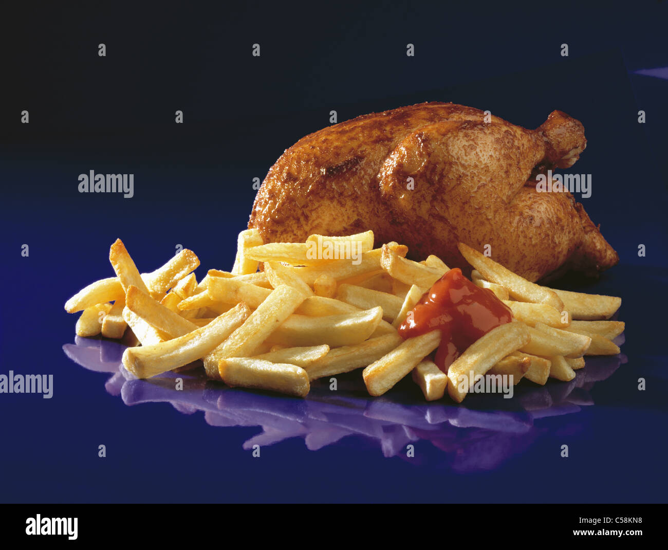 Cut out: Fried chicken and french fries with ketchup Stock Photo