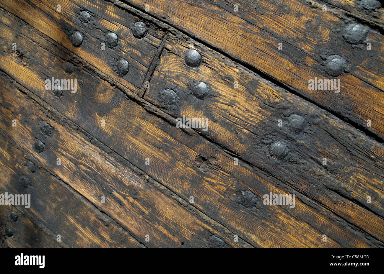 Hull boarding of an old wooden steam ship . Boards are ...