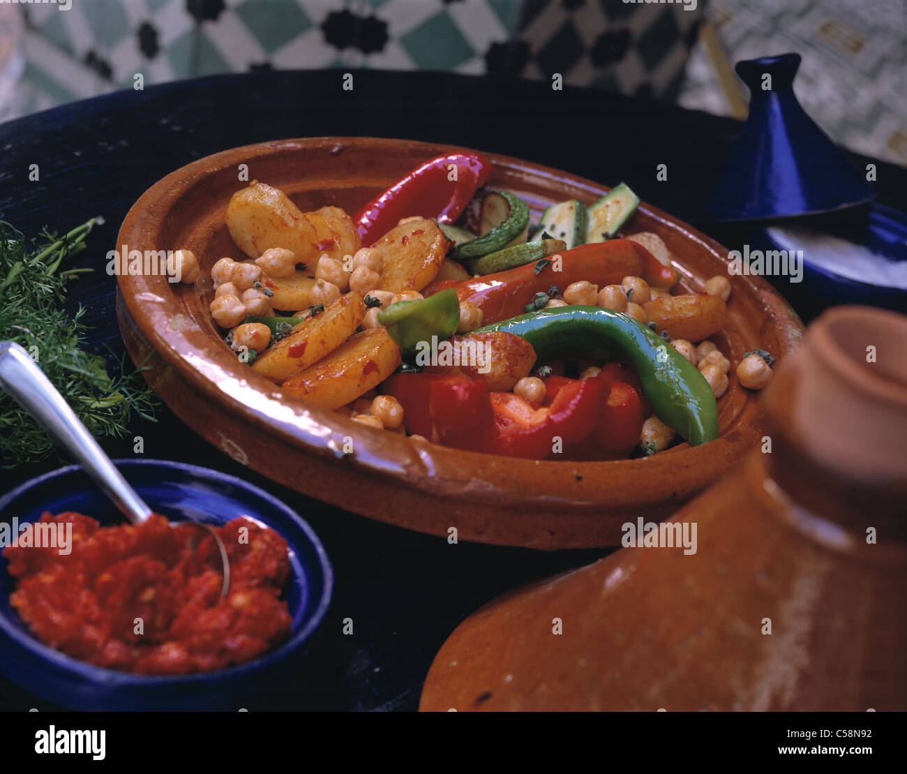 Vegetable potato tagine with harissa Stock Photo Alamy
