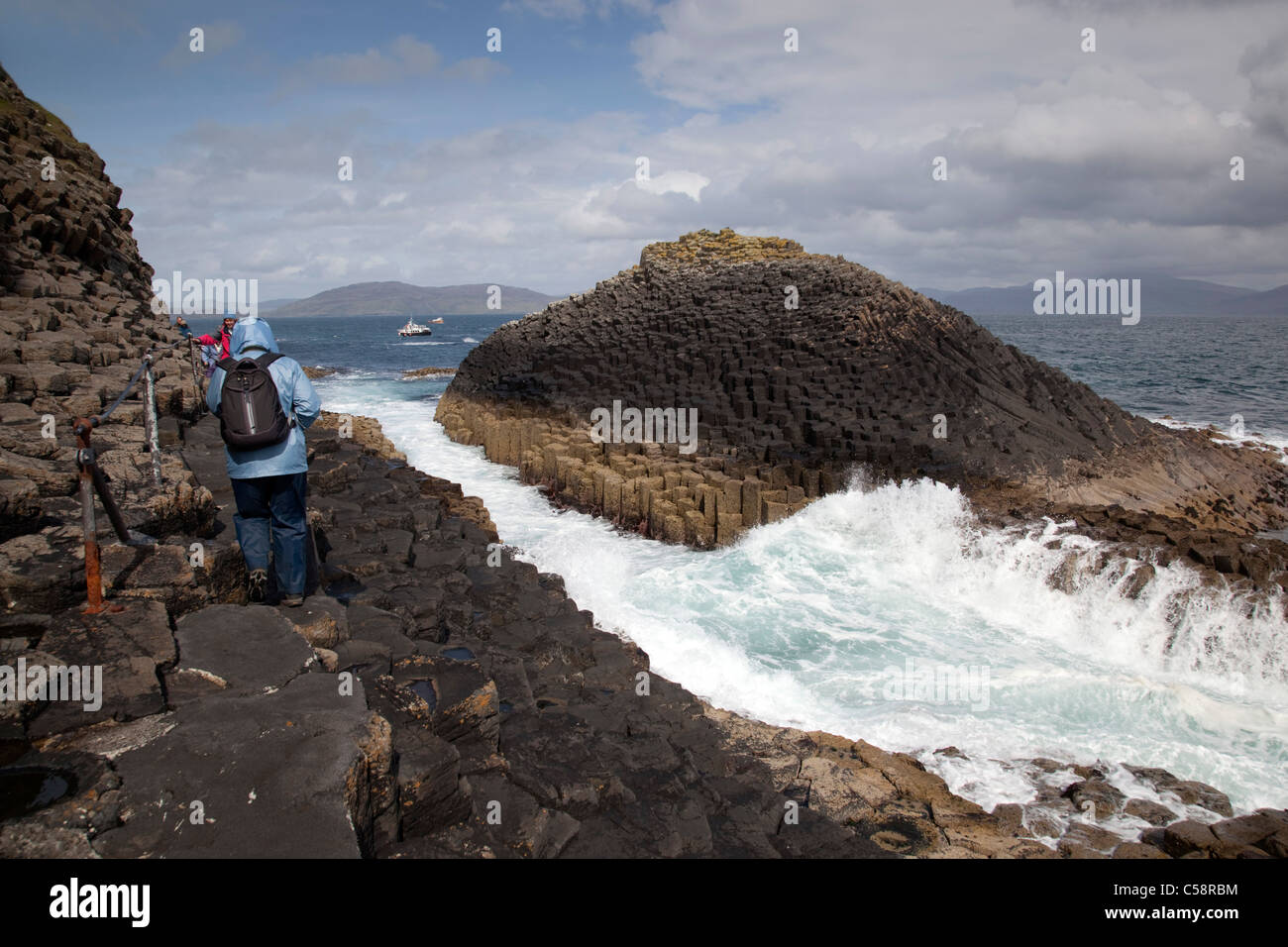 Staffa; tourists on the island; Scotland Stock Photo