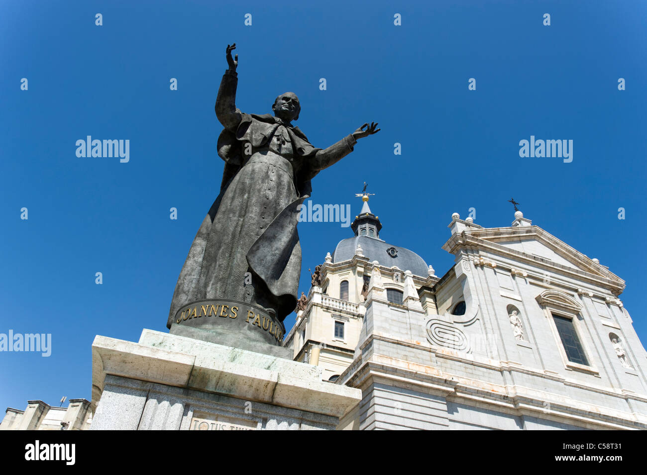 Statue of Pope John Paul II in front of the Almudena Cathedral, Madrid, Spain Stock Photo