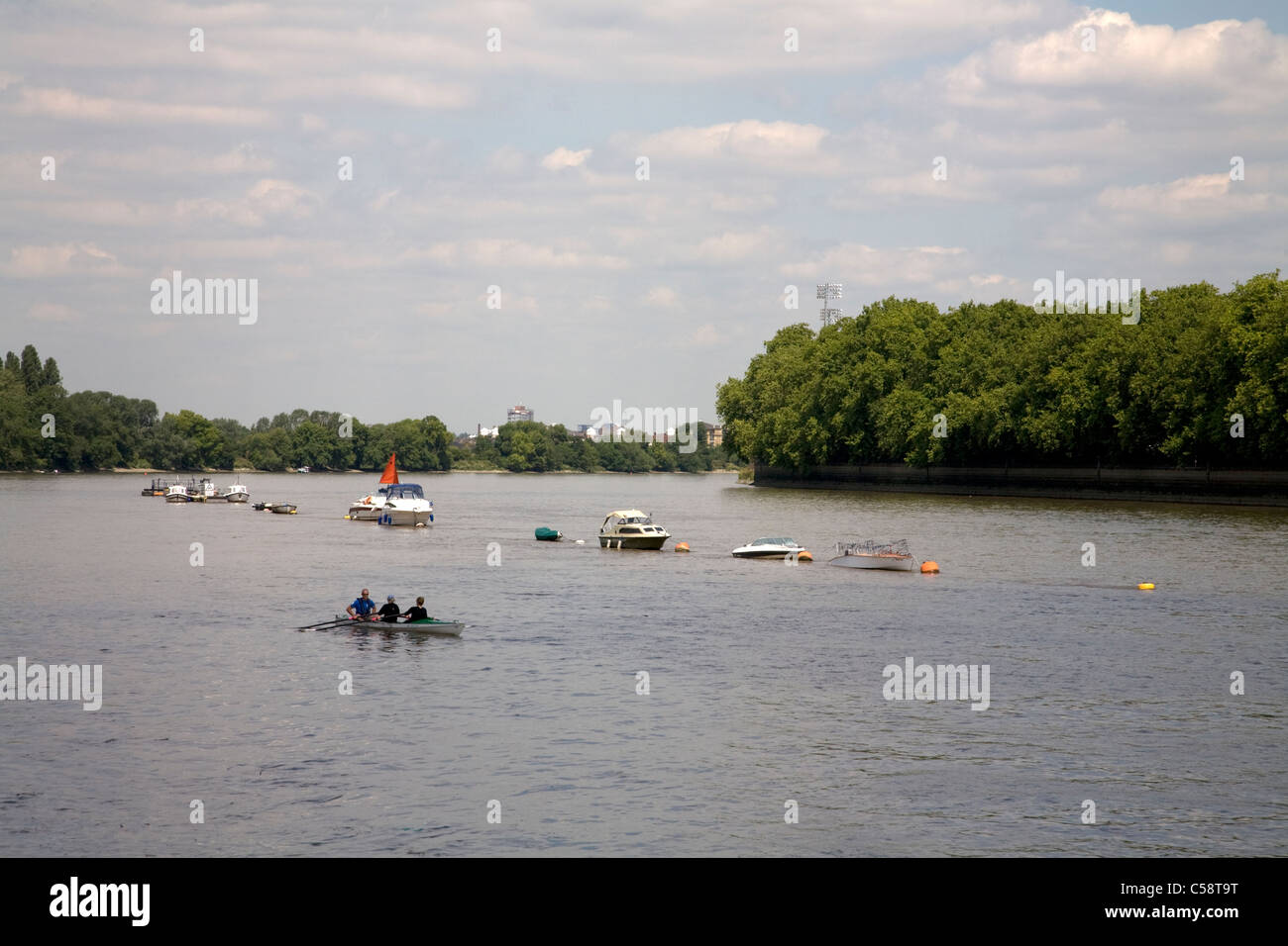 river thames looking west from putney bridge london england Stock Photo