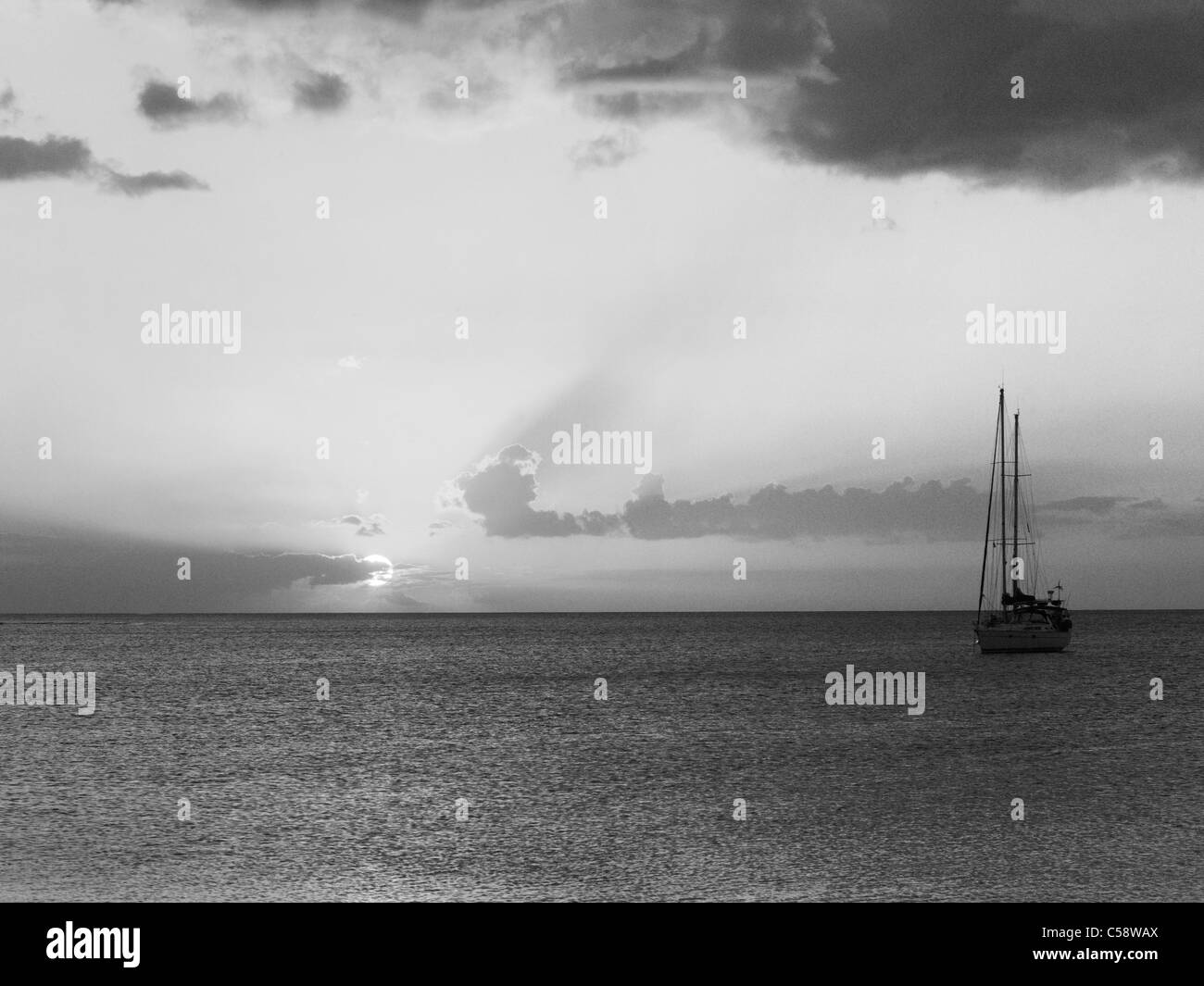 Mauritius Seascape Sunset Over Sea And Sailing Boat Stock Photo