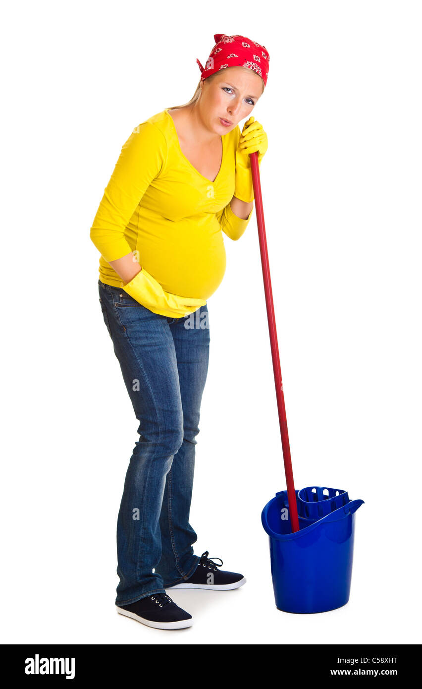 Tired pregnant woman cleaning the floor isolated on white Stock Photo