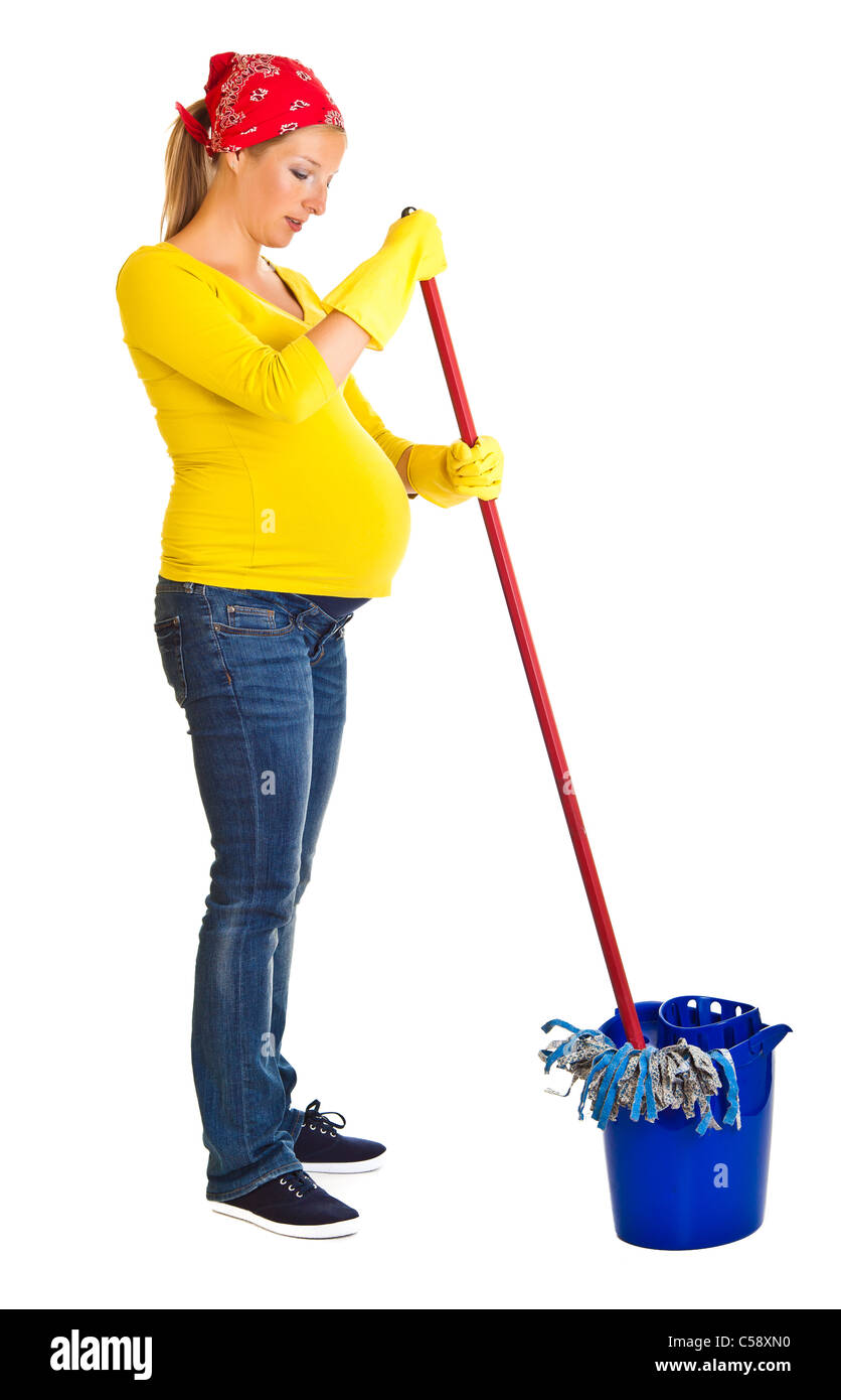 Tired pregnant woman cleaning the floor isolated on white Stock Photo