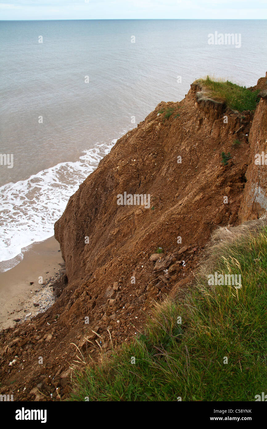 Clay cliff erosion on east coast of Yorkshire in the UK. Stock Photo