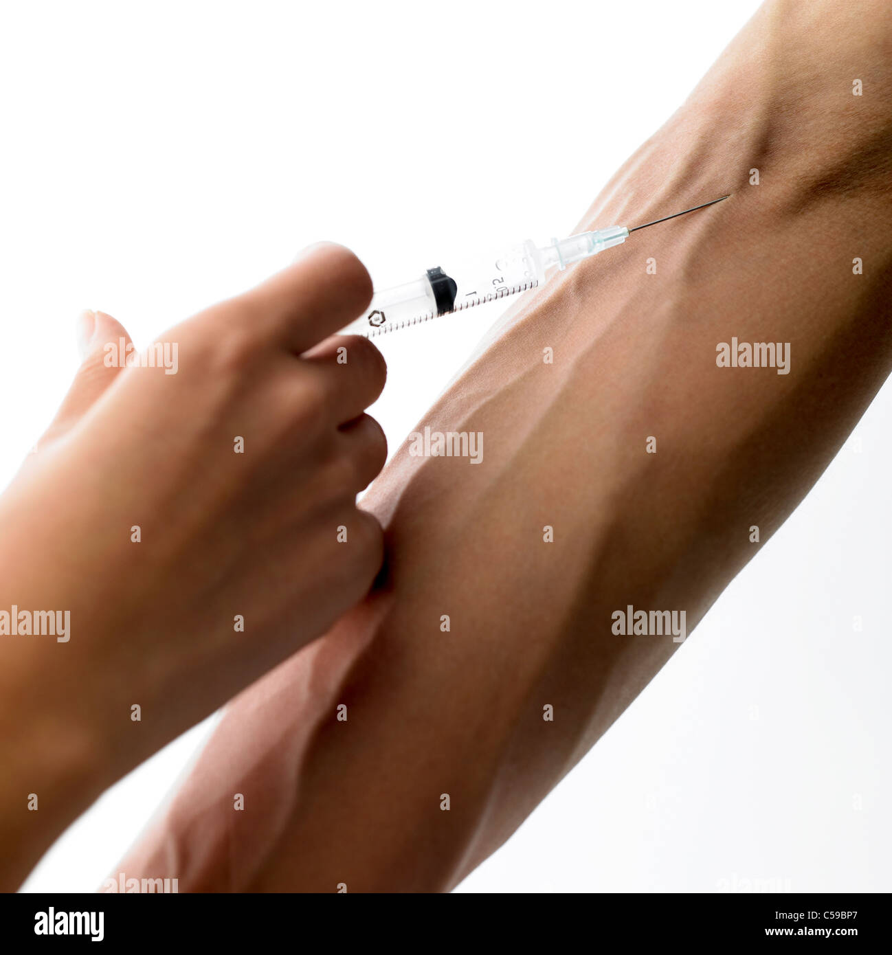 Close-up of doctor giving injection to patient Stock Photo - Alamy