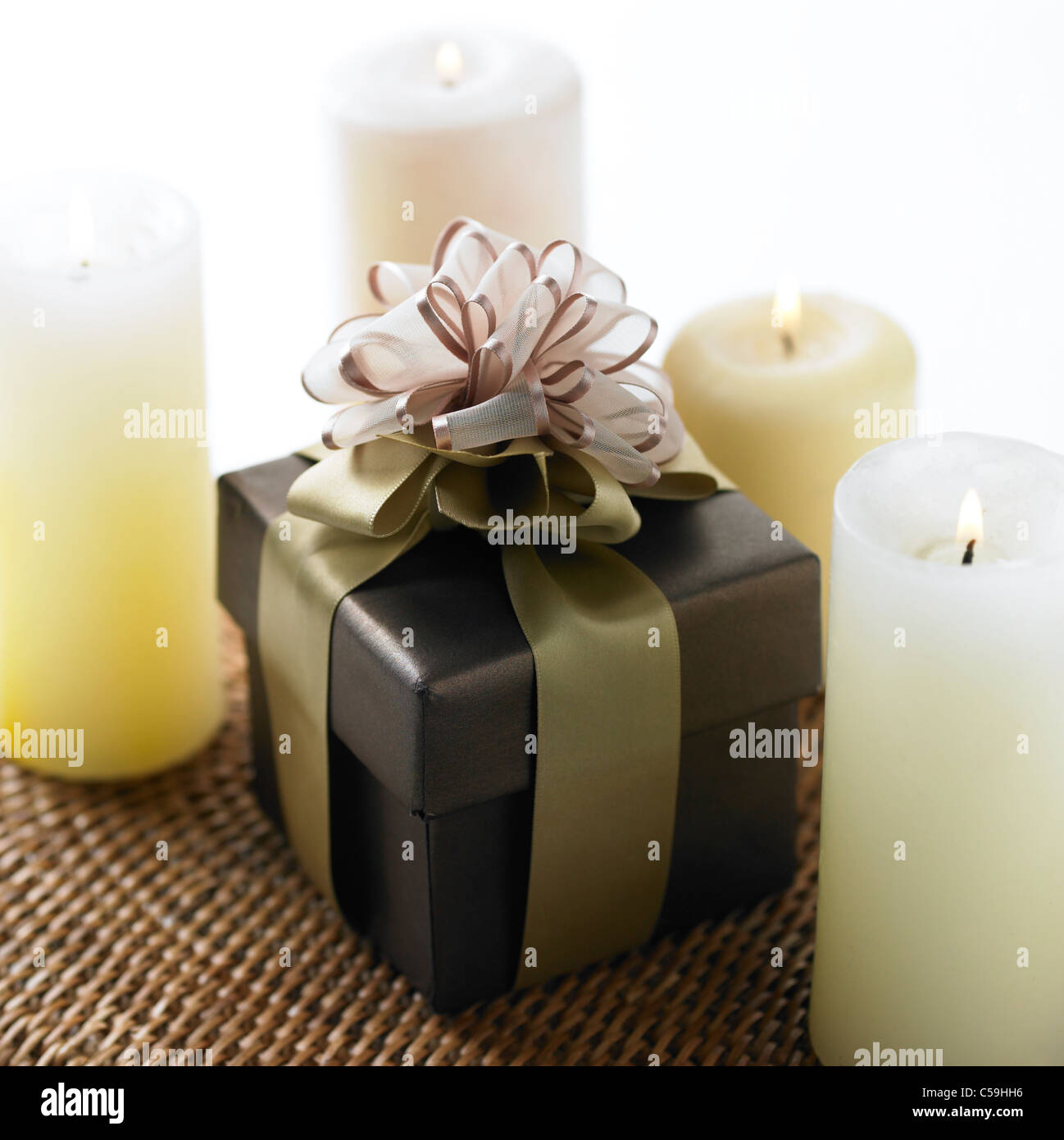 Close-up of Gift box with candles Stock Photo