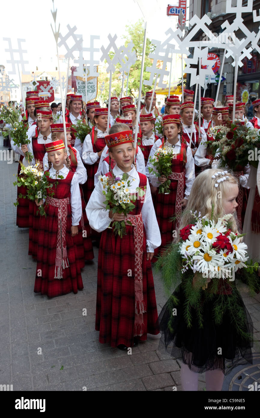 RIGA, LATVIA - JULY 10: A parade by festival participants of Latvian Youth Song and Dance Celebration through the centre of Riga Stock Photo