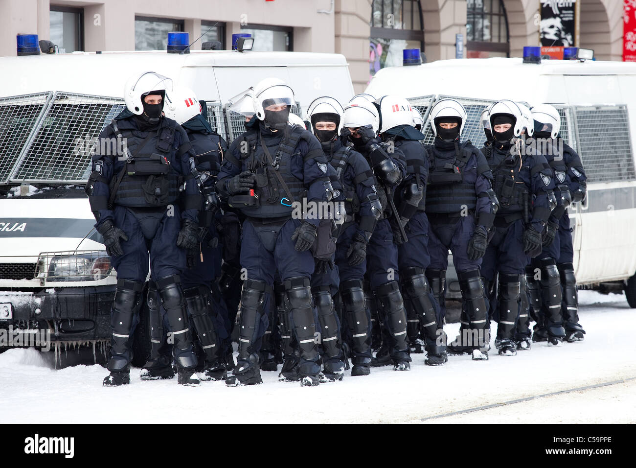 Riot police officers ready to prevent provocations at Commemoration of the Latvian Waffen SS unit or Legionnaires. Stock Photo