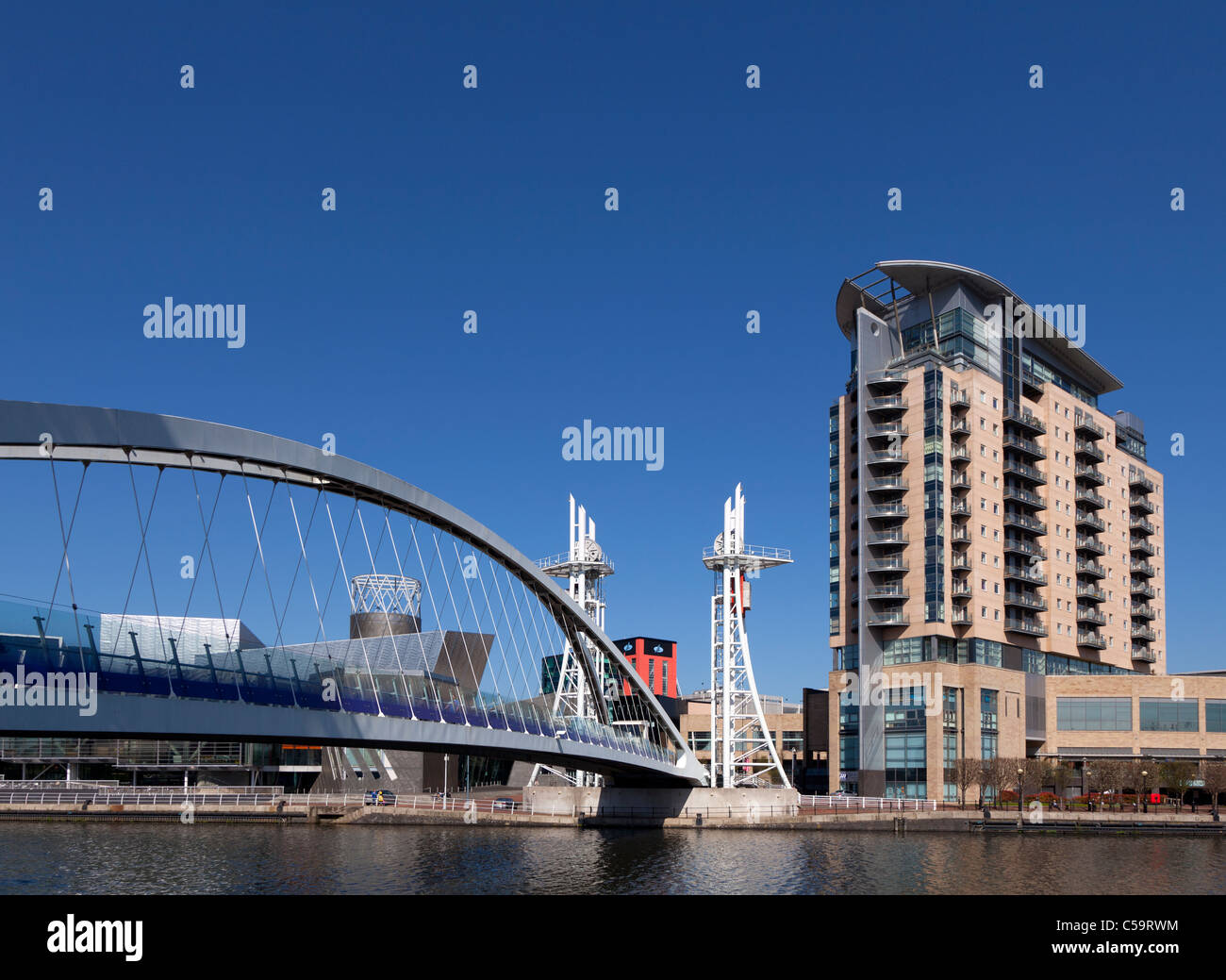 Lowry bridge and Lowry Outlet Mall, Salford quays, Greater Manchester, England Stock Photo