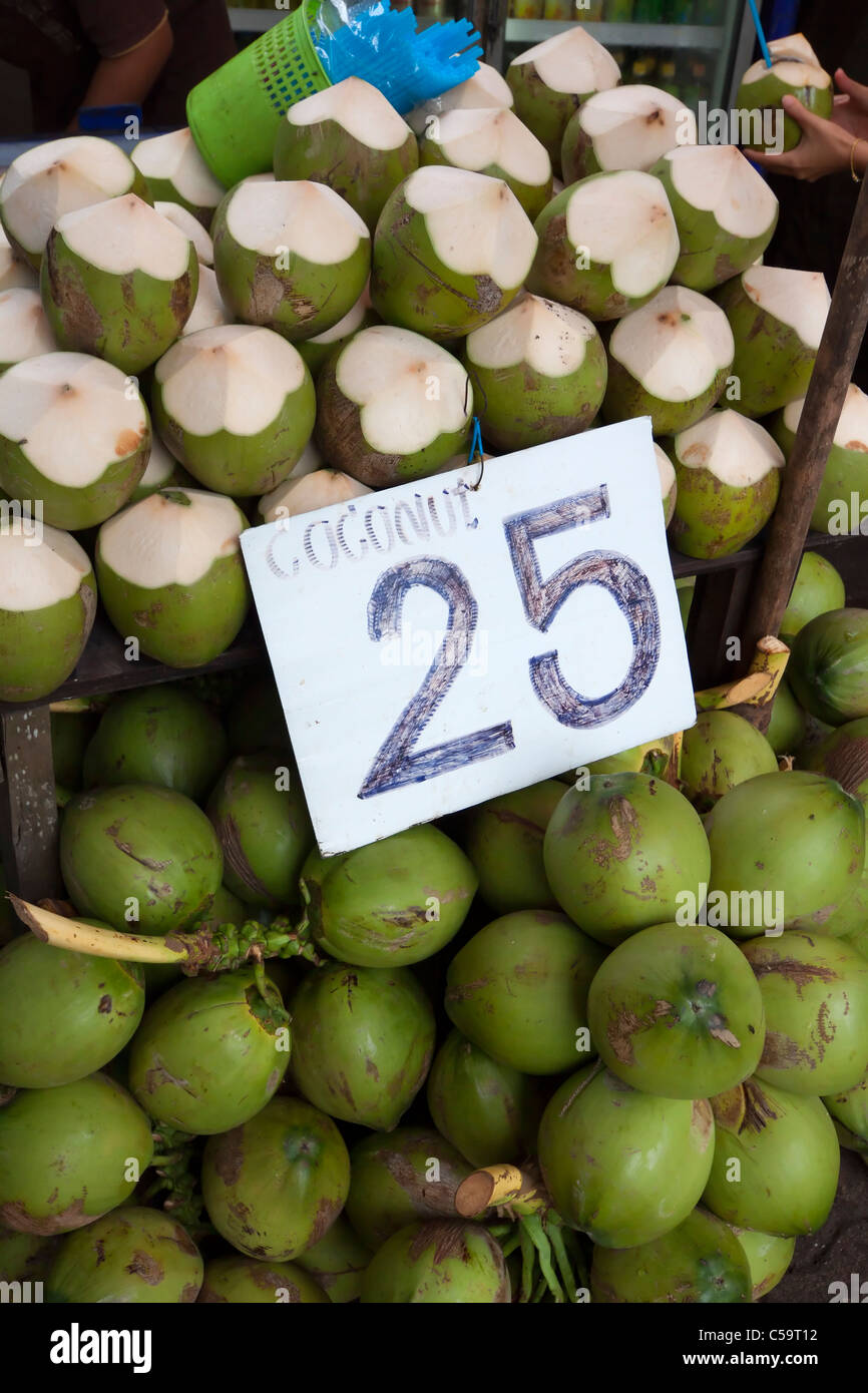 Green coconuts ready for drink are for sale in Thailand Stock Photo Alamy