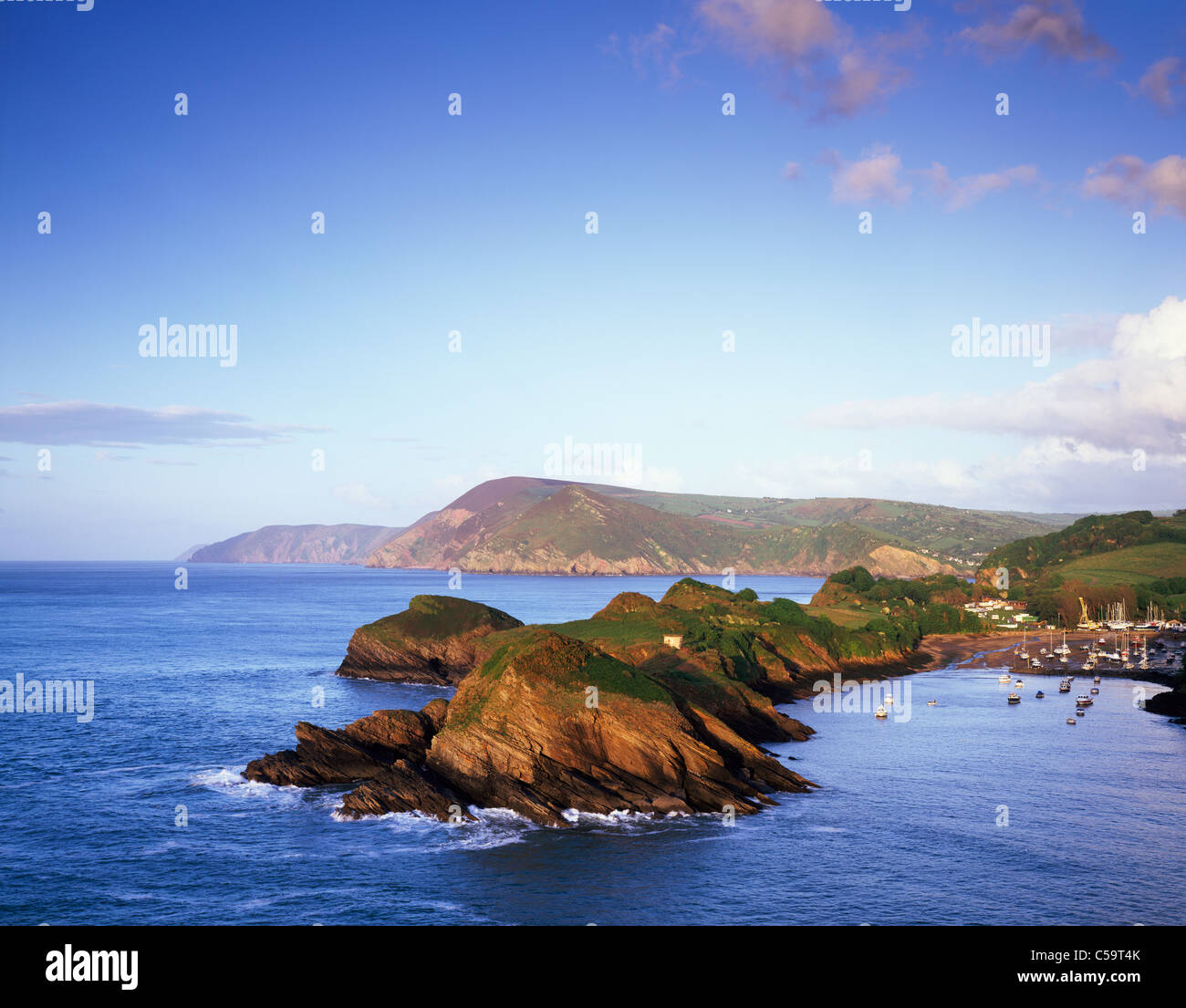 Sextons Burrow and Watermouth near Combe Martin viewed from Widmouth Head. Devon, England. The cliffs of Exmoor can be seen in the distance. Stock Photo