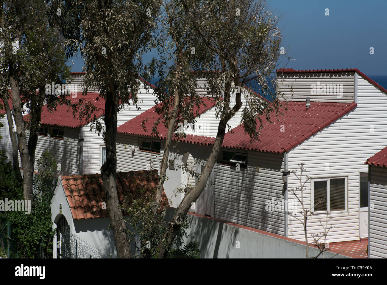 Houses and trees at Both Worlds Sandy Bay Gibraltar Stock Photo