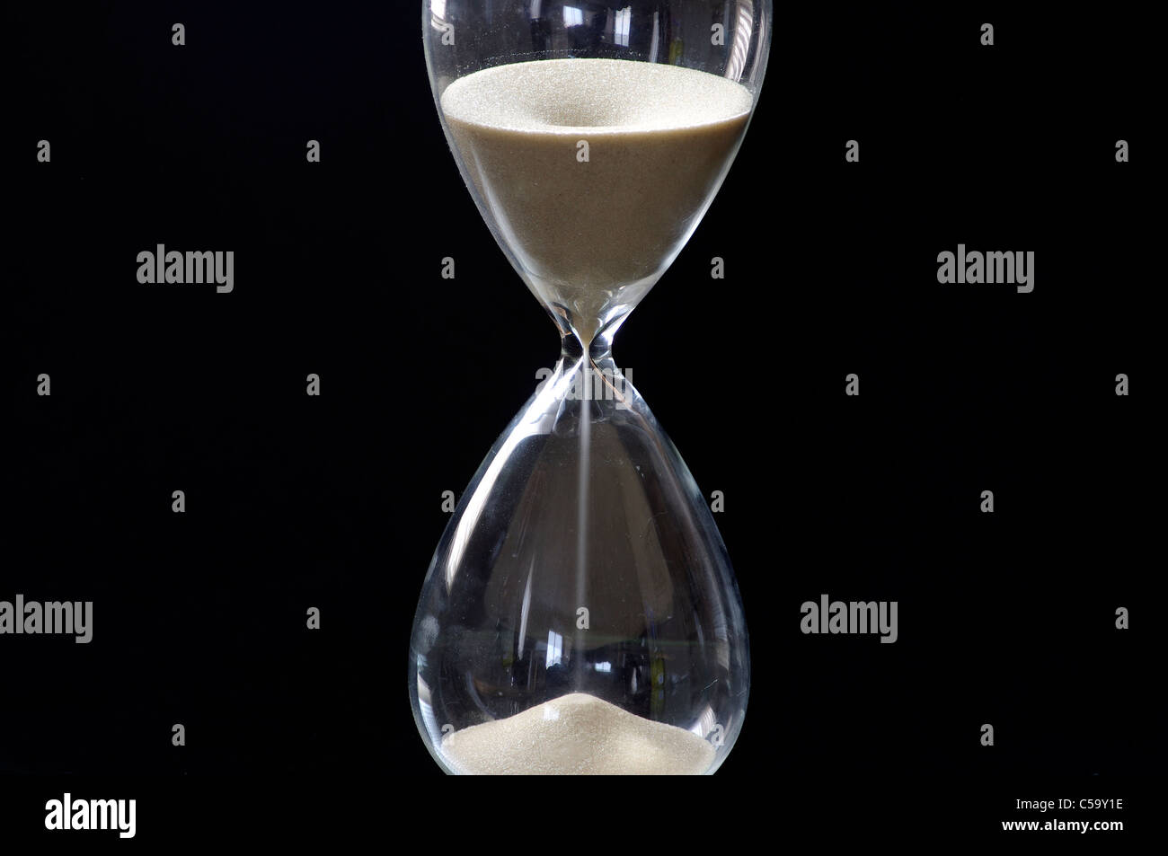 Hourglass - the symbol of elapsed time. Stock Photo