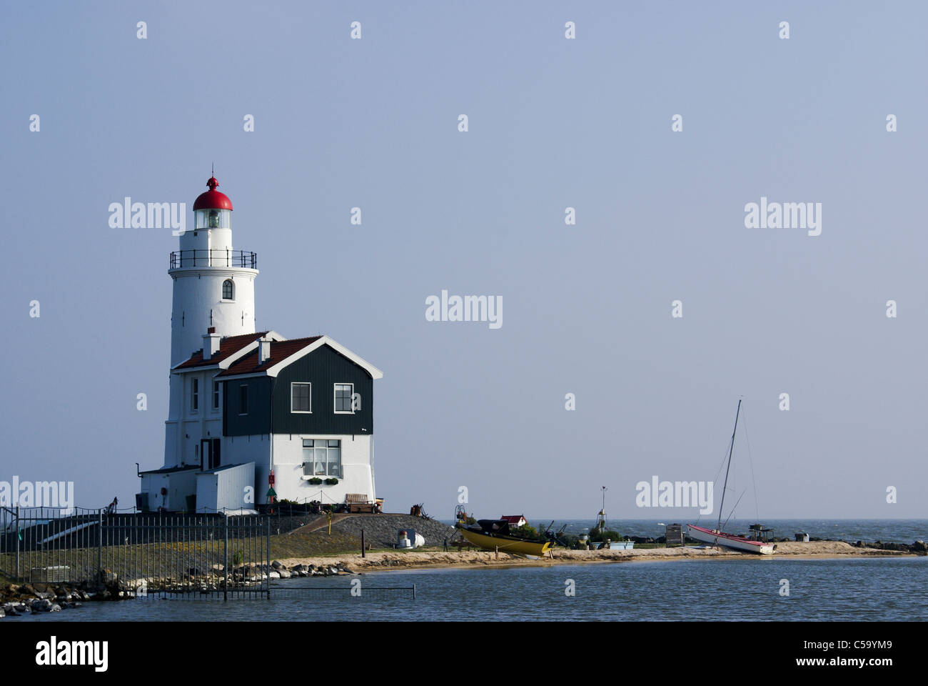 The Paard van Marken ('Horse of Marken') is a lighthouse on the Dutch peninsula Marken, on the IJsselmeer. It was built in 1839. Stock Photo
